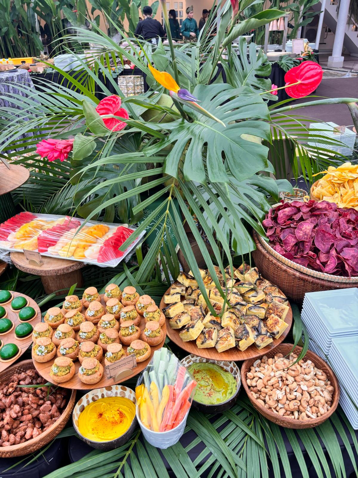 Premium event VIP buffet with floral arrangements